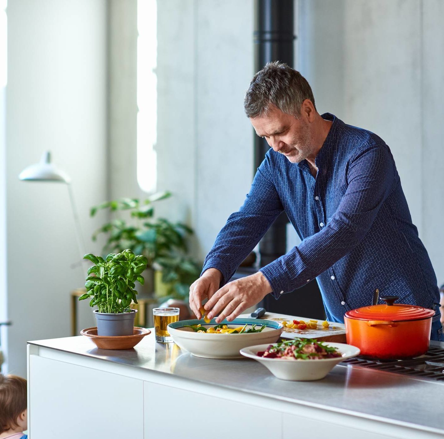 Chef in a kitchen cooking with New Zealand beef bone broth